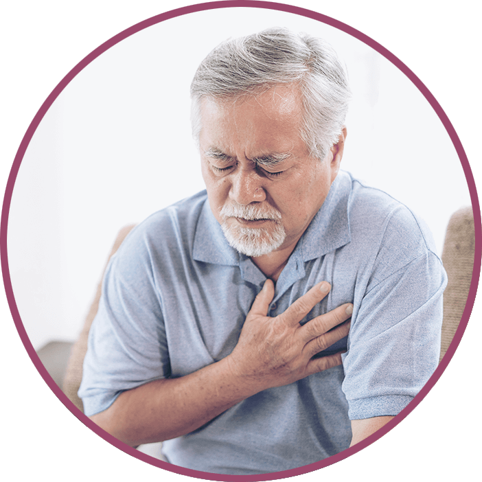 man holding chest in pain