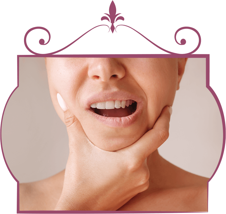 Woman holding mouth and jaw