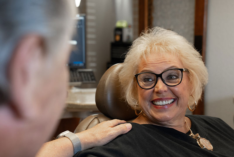 Paitent smiling at doctor