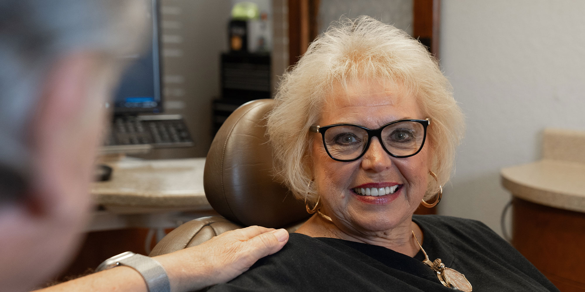 lady with new teeth hero